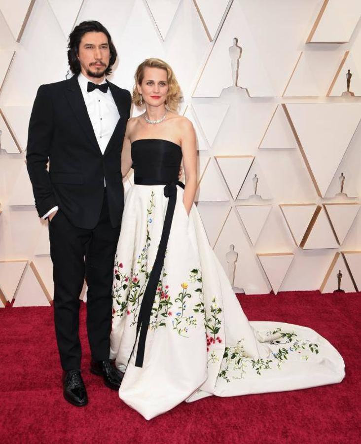 Adam Driver, de Burberry, y Joanne Tucker, de Oscar de la Renta.