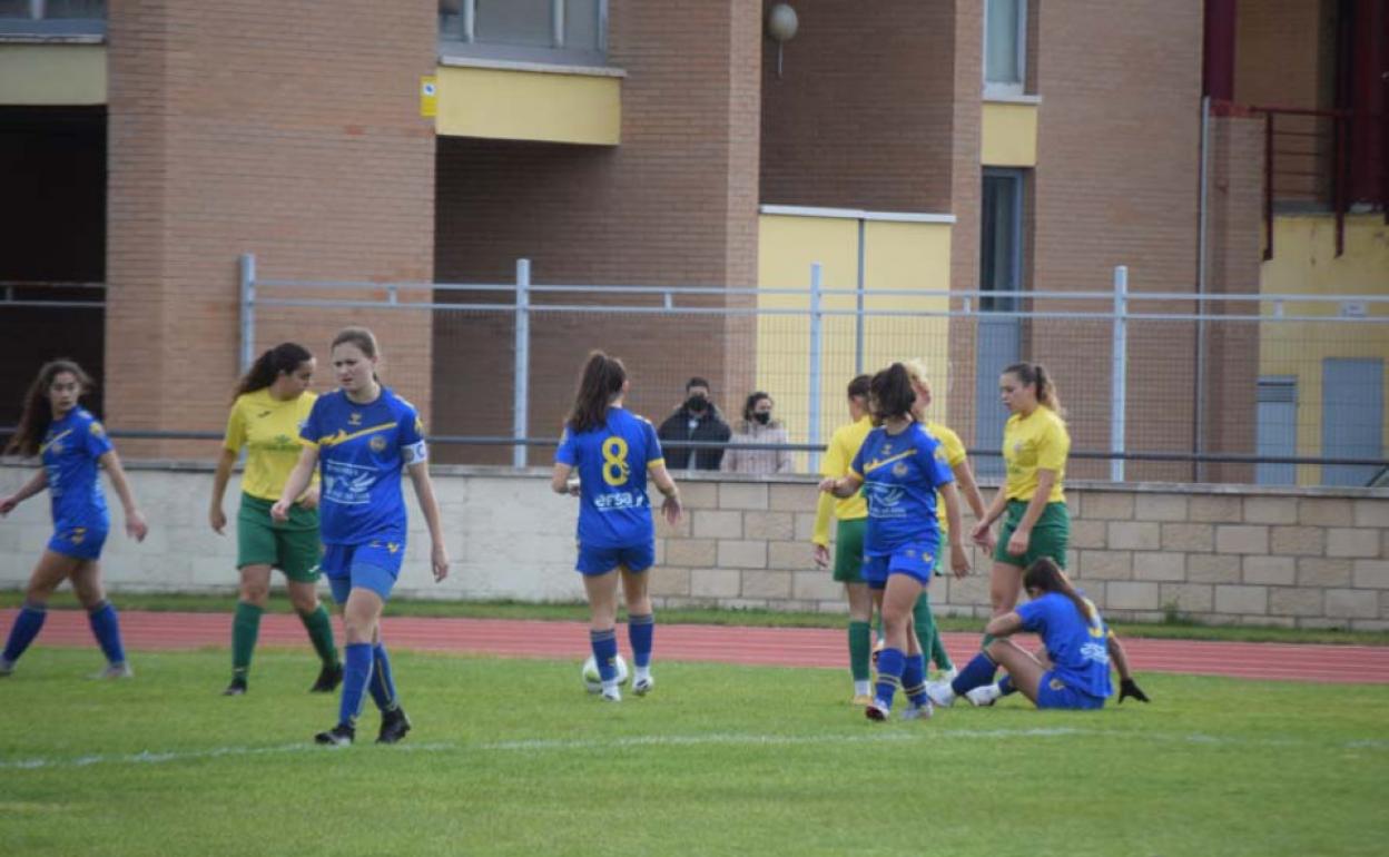 Un lance del duelo entre Amigos del Duero y Olímpico. 