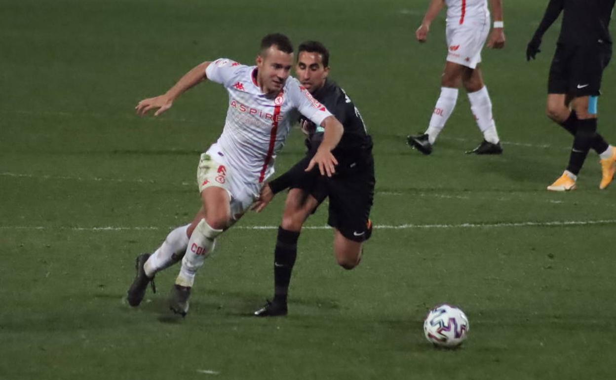 Marc Rovirola, en una acción del partido.