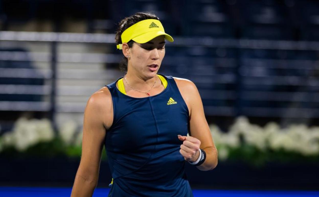 Muguruza celebra un punto en su partido ante Sabalenka.