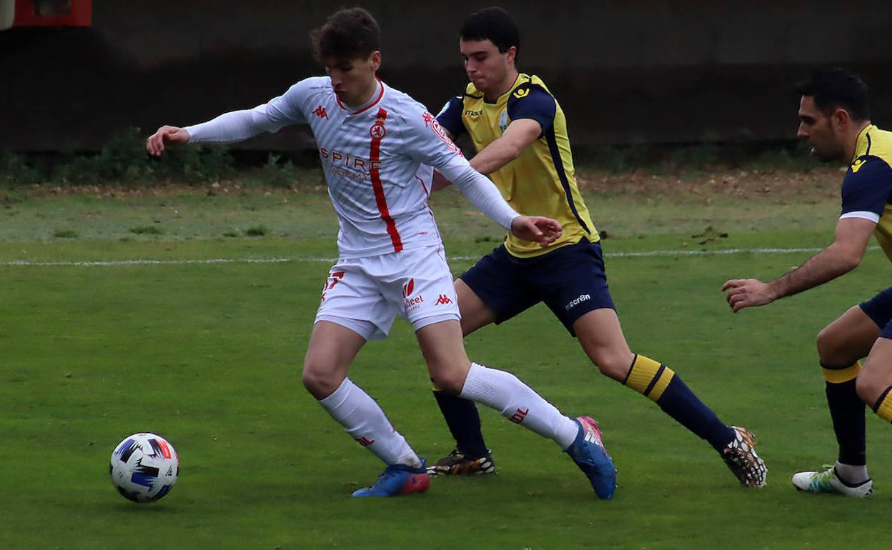 Percan, en un partido con el Júpiter.