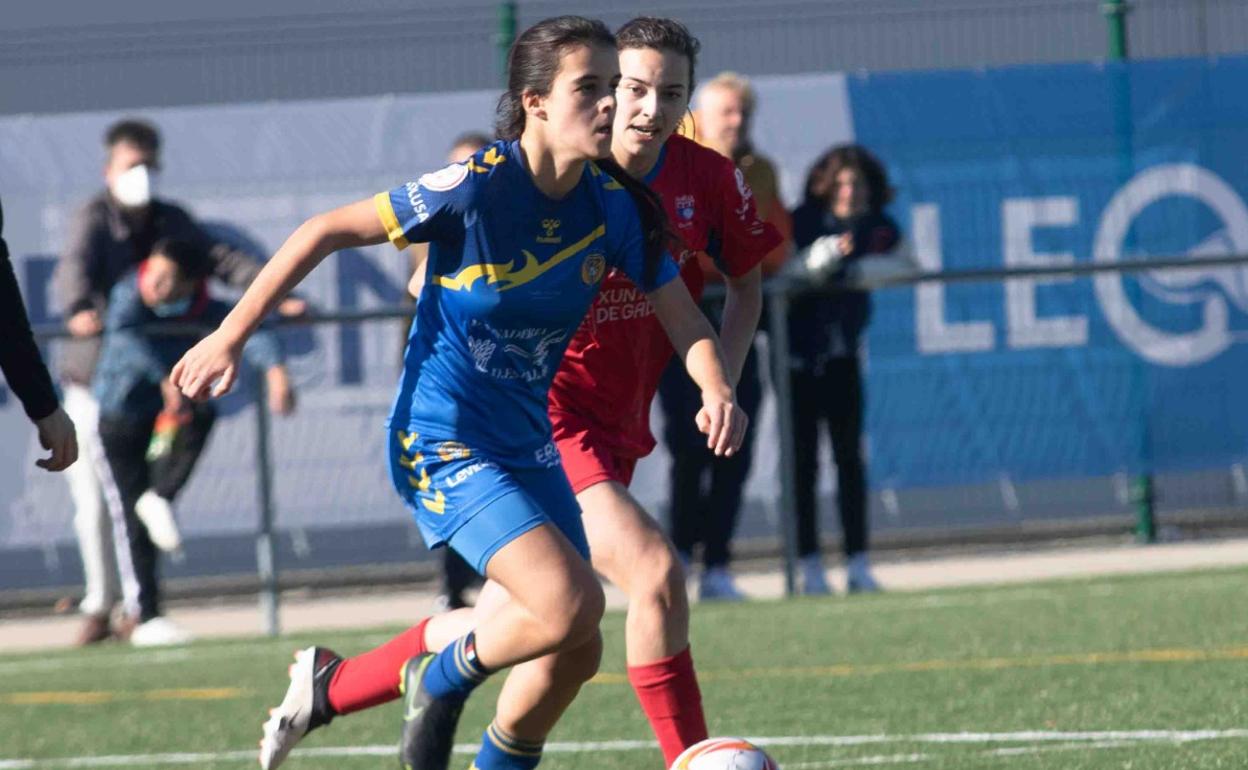 Un lance del partido.