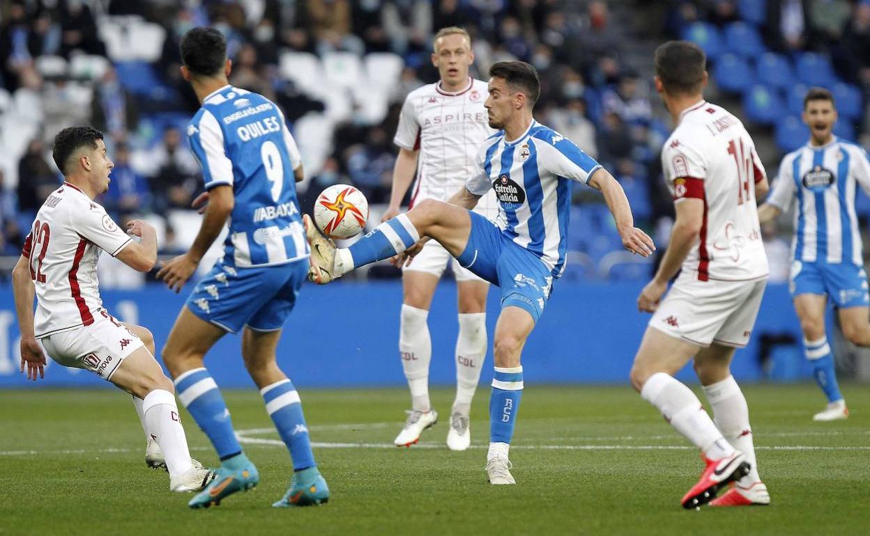 Sierra, Castañeda y Obolskii, en una acción en Riazor.