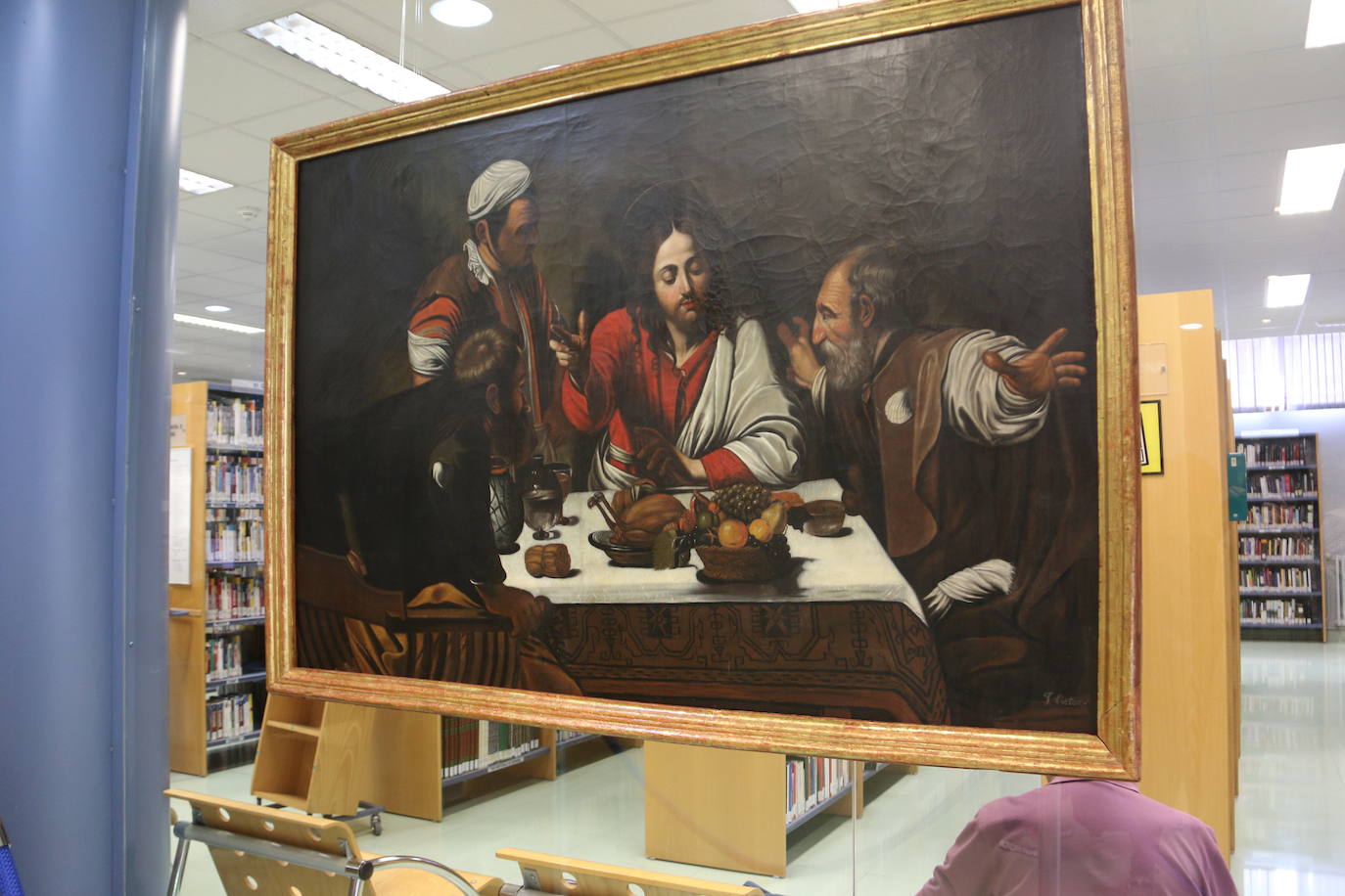 Presentación en la Biblioteca Pública de León de las dos obras restauradas por alumnas de la Escuela de Arte.