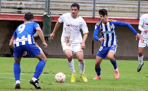 Galería. El catarí Mostafa fue una de las novedades en el once del Júpiter.