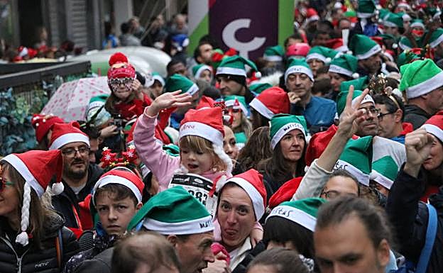 Galería. Imágenes de la XXV San Silvestre Popular Ciudad de León, carrera que congregó a más de 7.000 coredores en las calles de León.