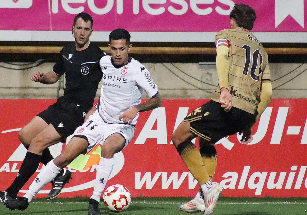 Bicho, en una acción del partido.