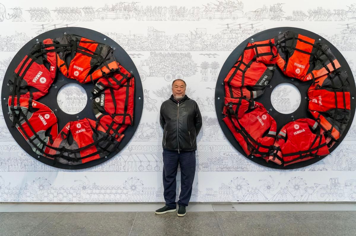 El artista chino Ai Weiwei junto a una de sus obras expuestas en el Musac.