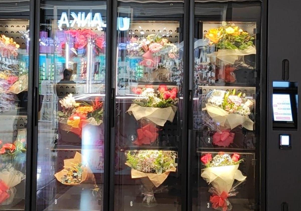 Maquina expendedora de flores en León.
