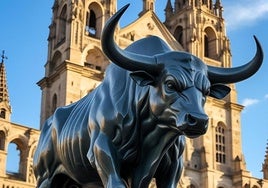 Simulación del toro metálico con la imagen de una catedral de fondo recreada con IA.