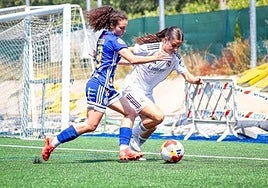 Un lance del partido entre Olímpico y Real Madrid.