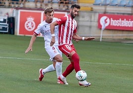 Rodri, en una acción con Leo Baptistao.