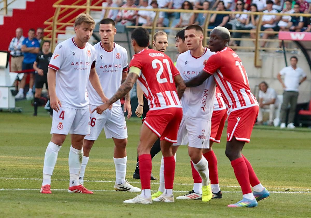 Rodri, Barzic y Paraschiv, en el partido ante el Almería de la segunda jornada.
