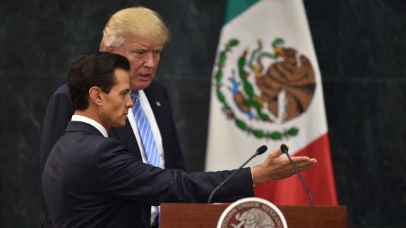 El presidente mexicano, Enrique Peña Nieto, junto a Donald Trump.