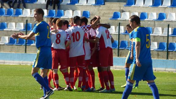 La selección autonómica celebra uno de los goles.