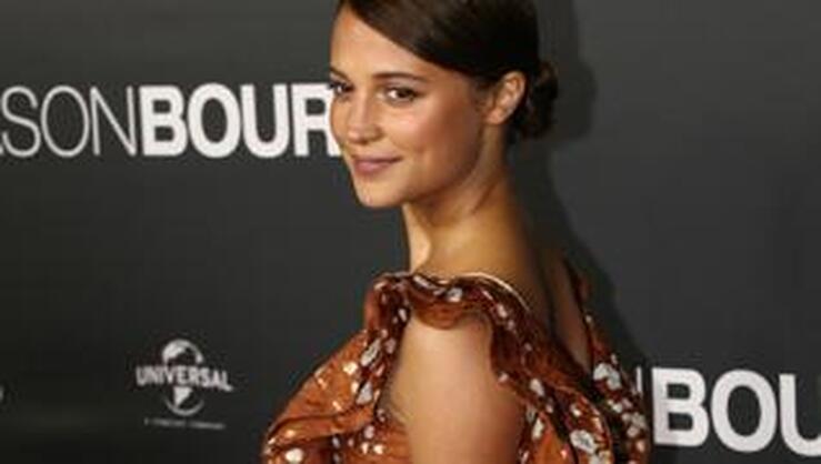 Fotos: ¿De quién es el 'vestido de flamenca' de Alicia Vikander en Sídney?