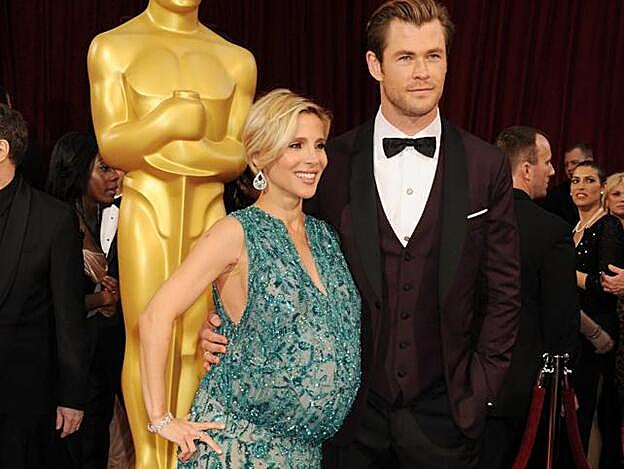 Galería. El matrimonio Hemsworth - Pataky en los Oscar de 2014