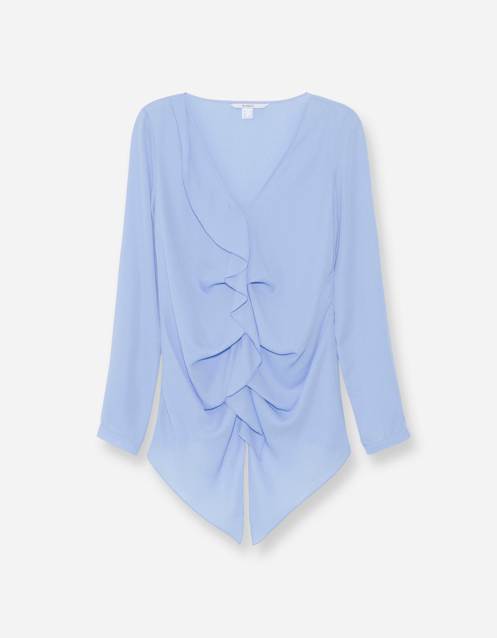 De manga larga y con volantes en la parte delantera, esta favorecedora blusa está de rebajas (Precio rebajado de 35.99 euros a 10 euros)