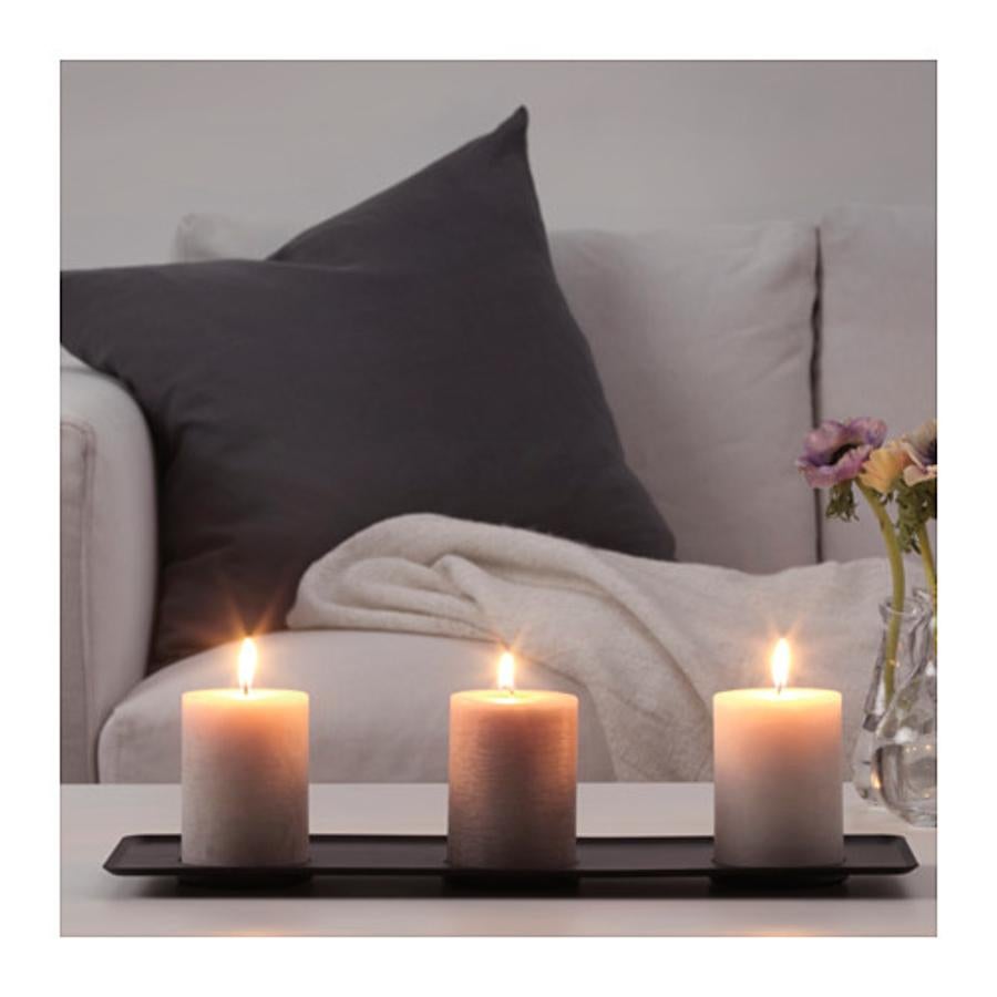 3 velas gruesas sin perfume de Ikea (4'99€).