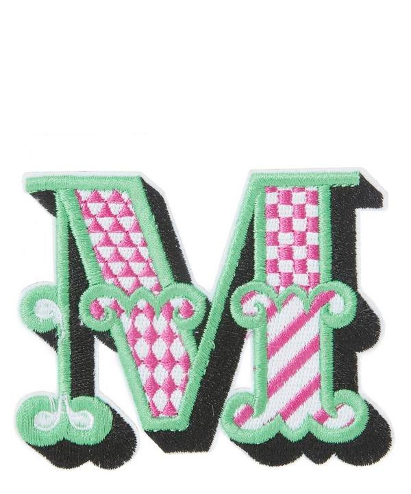 Pegatina con inicial bordada de LIberty London. CPV.