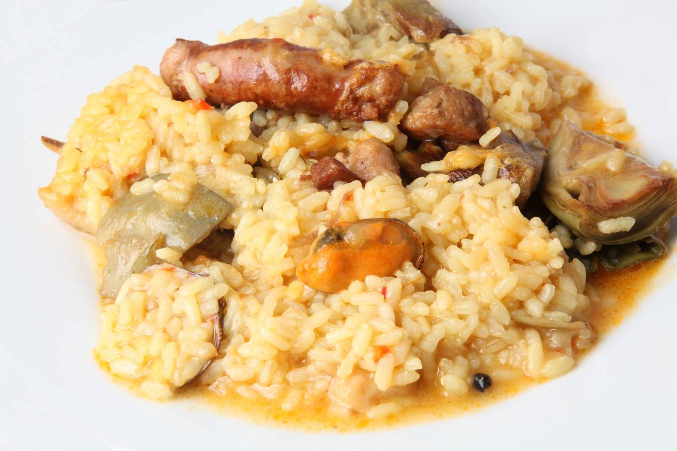 El índice glucémico del arroz caldoso es alto, de 90, según la lista de alimentos de Montignac.