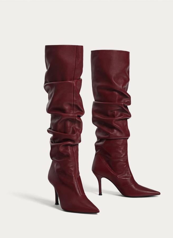 Botas de piel arrigadas de Uterqüe. Precio sin descuento: 199 euros.
