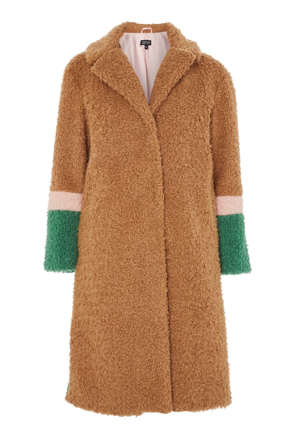 Abrigo Teddy cámel con detalles en verde y rosa de Topshop. Precio: 155 euros.