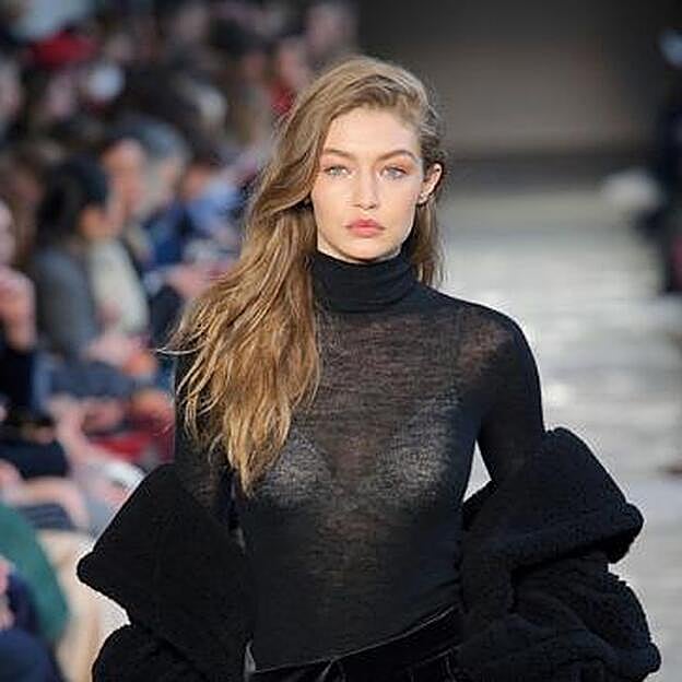 Gigi, chica Malibú. Es la hermana de rostro amable. Representa el prototipo de belleza californiana: melena rubia, cara angelical y medidas perfectas. MAX MARA