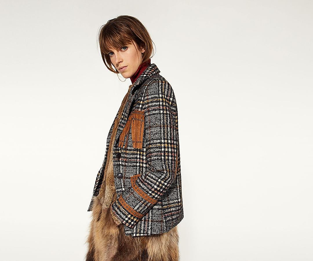 Chaqueta de cuadros de Sfera. Precio: 29,95 euros.