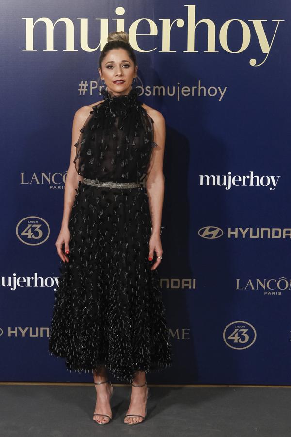 Miriam Hernán apostó por un diseño joya midi de Fernando Claro Costura.