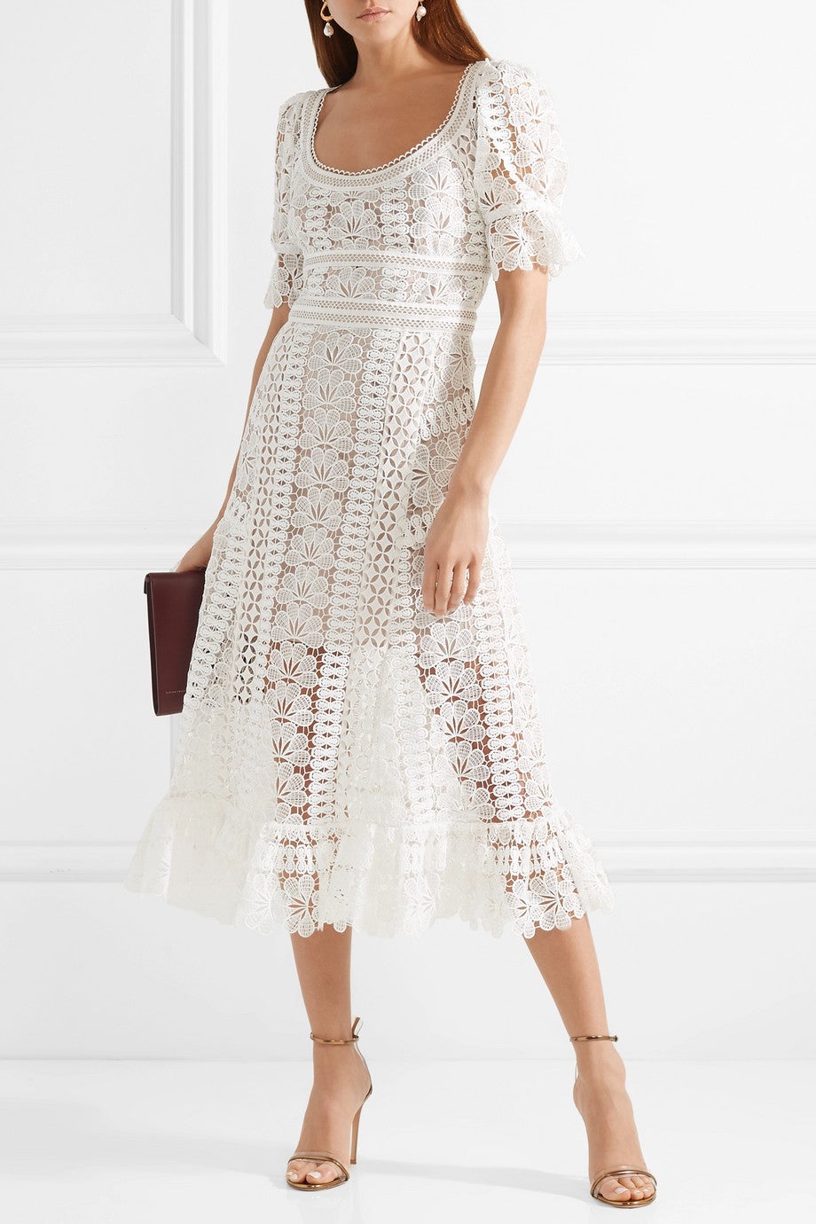 Vestido midi blanco con mangas abullonadas de Self Portrait para Net a porter. Precio: 397 euros.