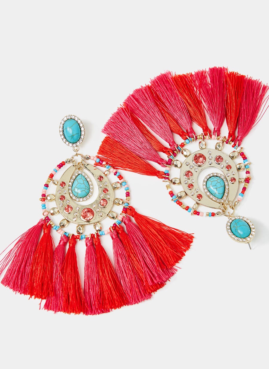 Pendientes joya con flecos de Uterqüe: 39 euros.