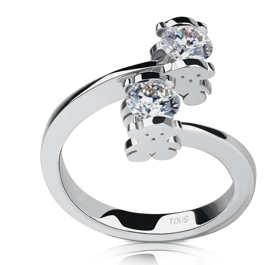 Solitario en oro blanco de 18kt y dos diamantes 0,08 qt