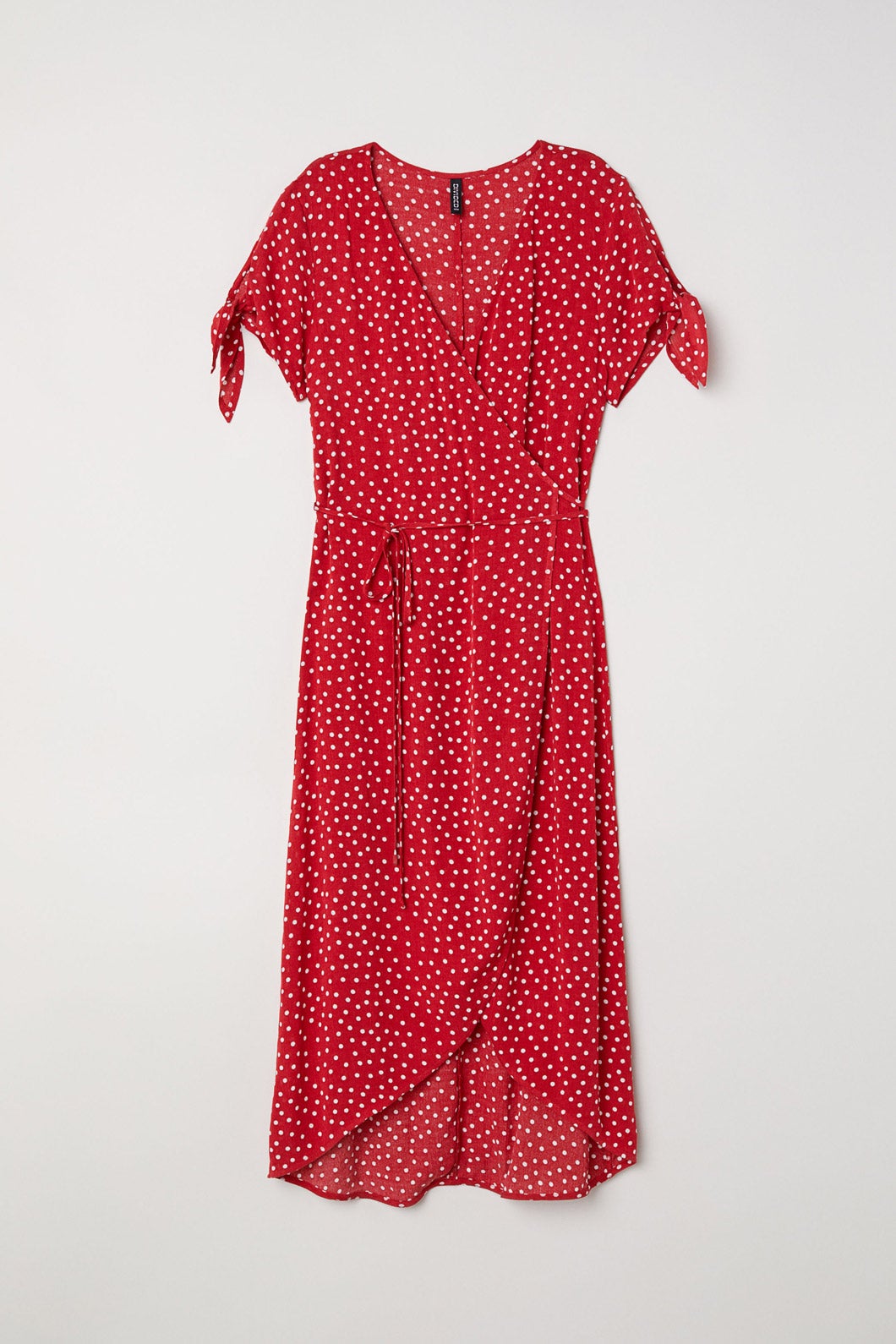 Vestido cruzado de crepe de H&M. Precio: 24,99 euros.