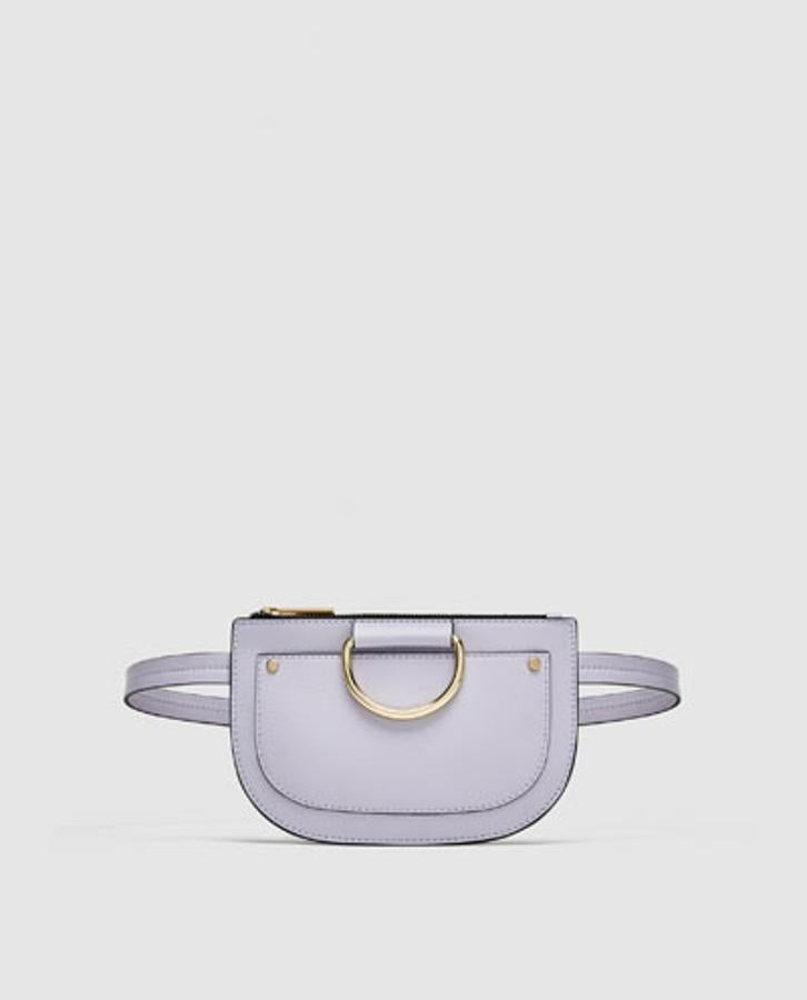 Riñonera con detalle de anilla en color malva, 19,95 euros.