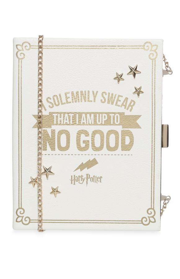 Bolso libro con cadena y mensaje, 14 euros.