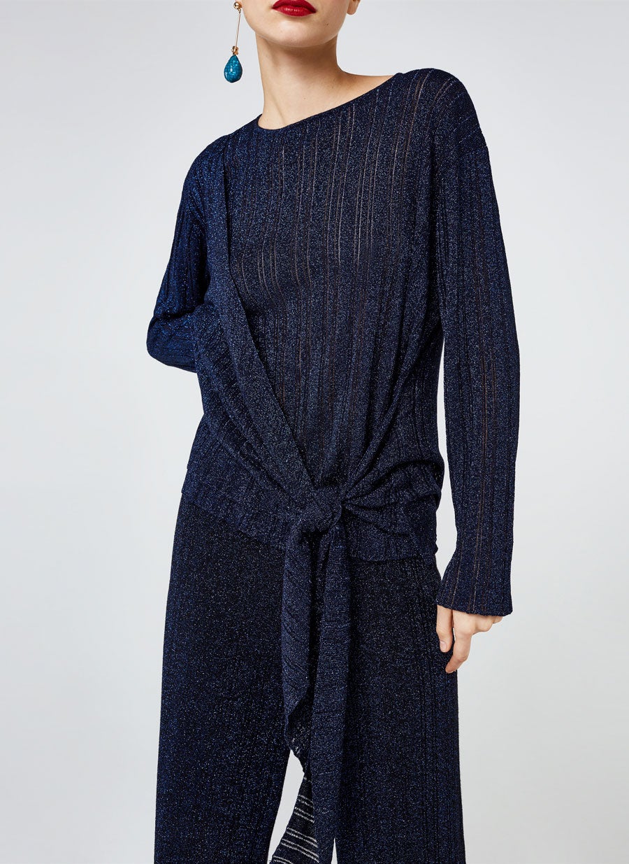 Camiseta de canalé confeccionado de Uterqüe: 29,95 euros.