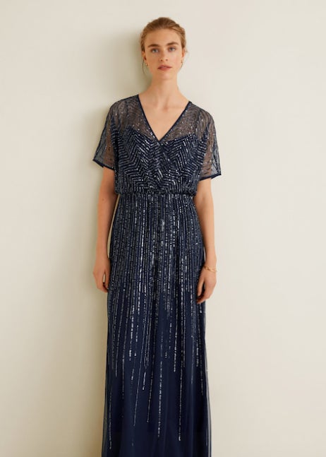 Vestido cruzado con manga larga y volantes de Asos: 26,49 euros.