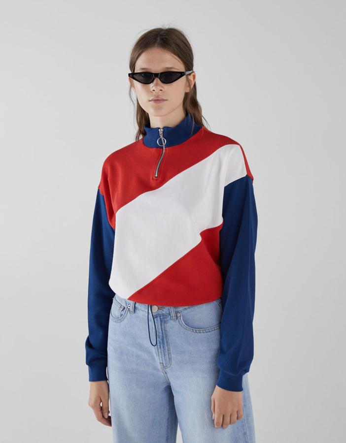 Sudadera con cremallera en color azul, rojo y blanco, 19,99 euros.