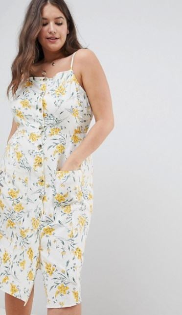 Vestido midi de lino. Con una americana, negra mejor que mejor, perfecto. Es un diseño precioso de Asos Design Curve (35,99 euros).