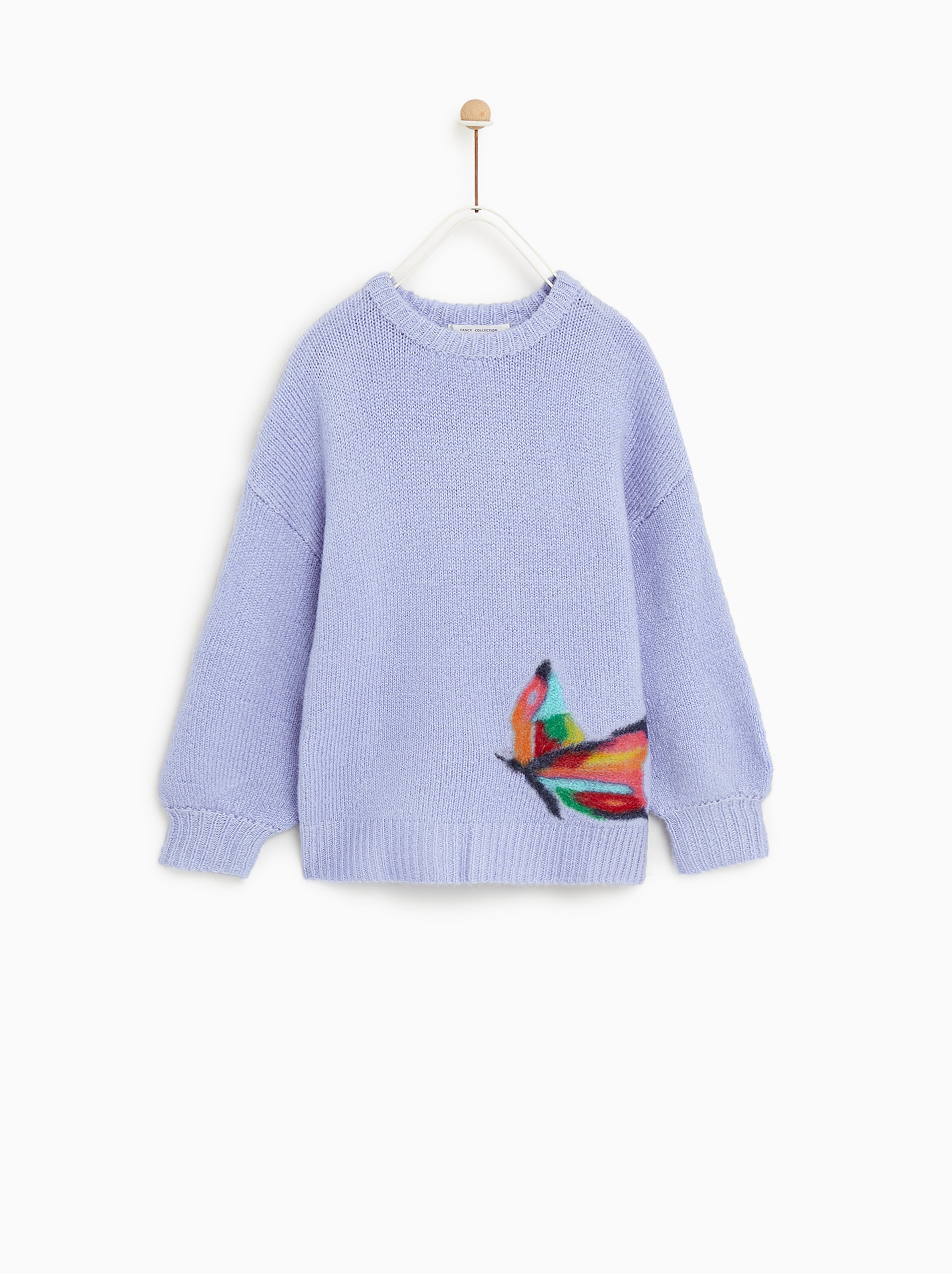 Jersey malva con dibujo de mariposa: 22,95 euros en Zara Kids.