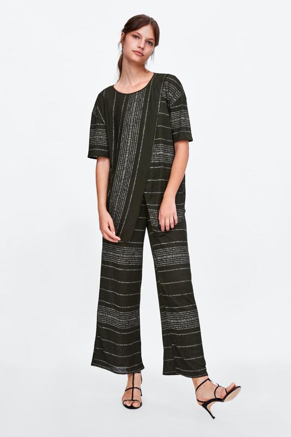 Aún más baratos son estos pantalones de punto verde musgo con hilos metalizados. Son de Zara, y cuestan solo 19.95 euros.