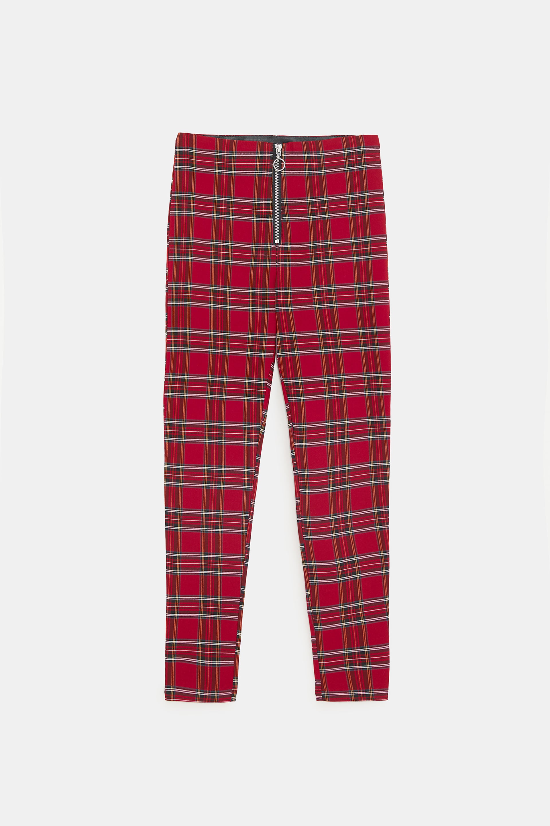 Legging con cuadros y cremallera de Zara: 19,95 euros.