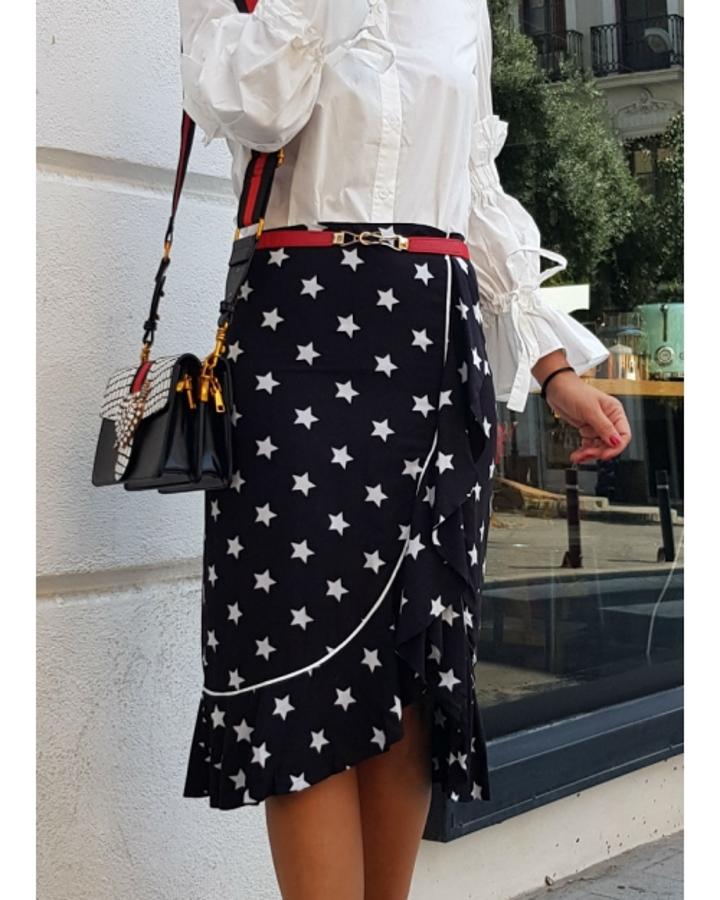 Un diseño cruzado azul marino y blanco, adornado con un discretísimo volante frontal (52 euros).