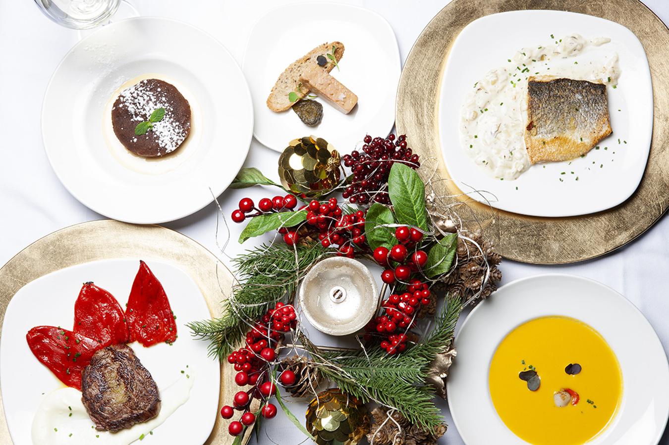 Este restaurante  referente de la histórica Gran Vía madrileña  ofrece un menú ideal para disfrutar en pareja o con amigos. De hecho, la propuesta culinaria de  El Mercado de la Reina  se completa con una fiesta en el Gin Club para terminar la noche de la mejor forma. Para empezar, el foie mi cuit sobre tosta de pan multicereal e higo en almíbar y la crema de calabaza y naranja con vieira gallega bosque abrirán este sensacional menú que cuenta como principales con una lubina salvaje sobre lecho de cebolleta tierna y trufa y un solomillo de vaca gallega con crema fina de patatas y piquillo confitado. Como broche final: tarta caliente de chocolate intenso sobre crema inglesa y tarta crumble de manzana caliente y helado de vainilla. No se puede pedir más, y más por los  99 euros (IVA incluido)  que cuesta la experinencia.