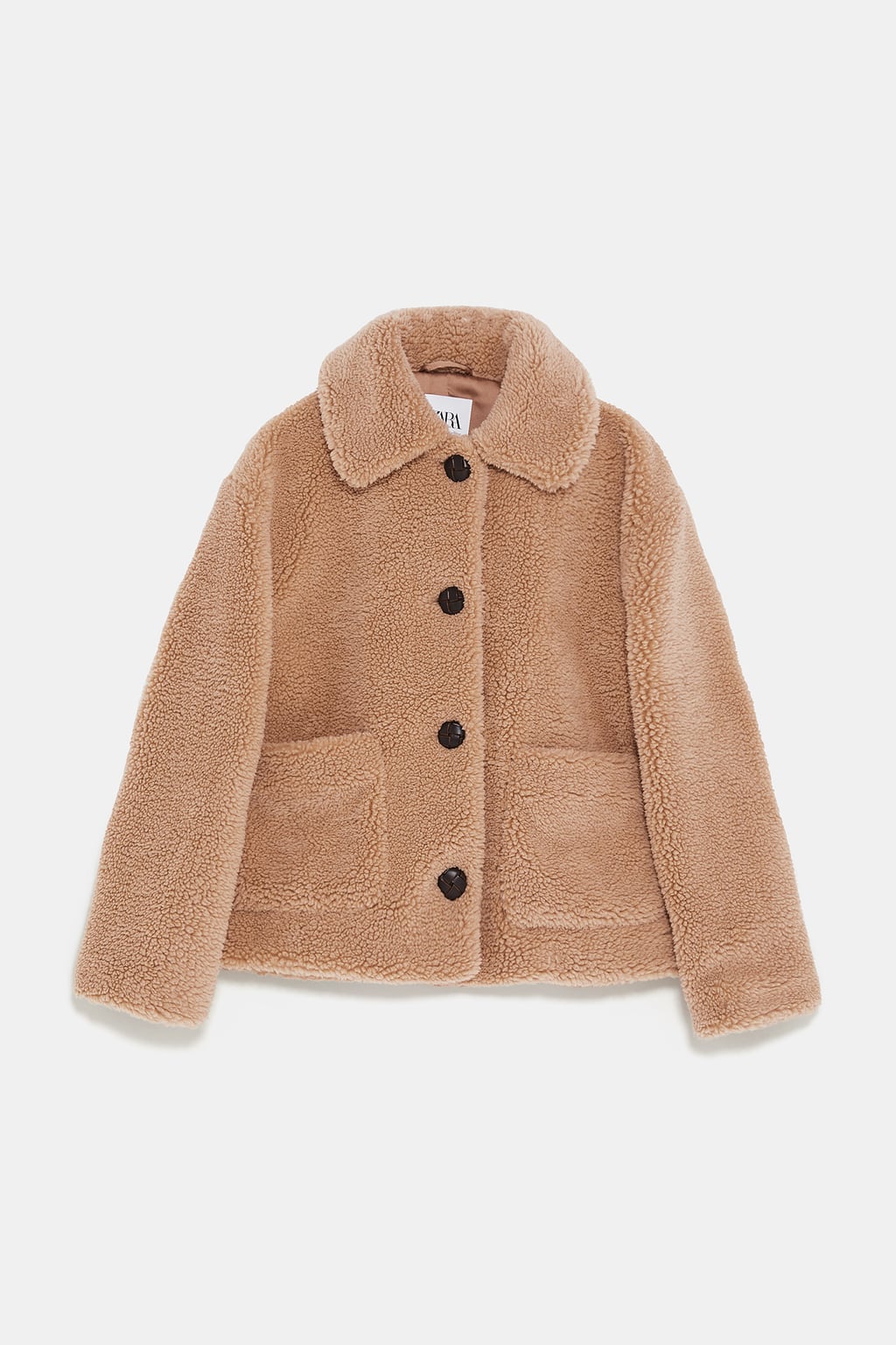 Cazadora de borreguito con botones de Zara: 49,95 euros.