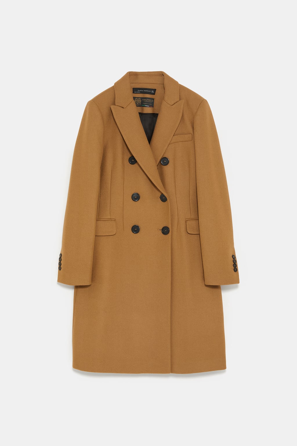Abrigo cruzado con botones y en color camel de Zara.