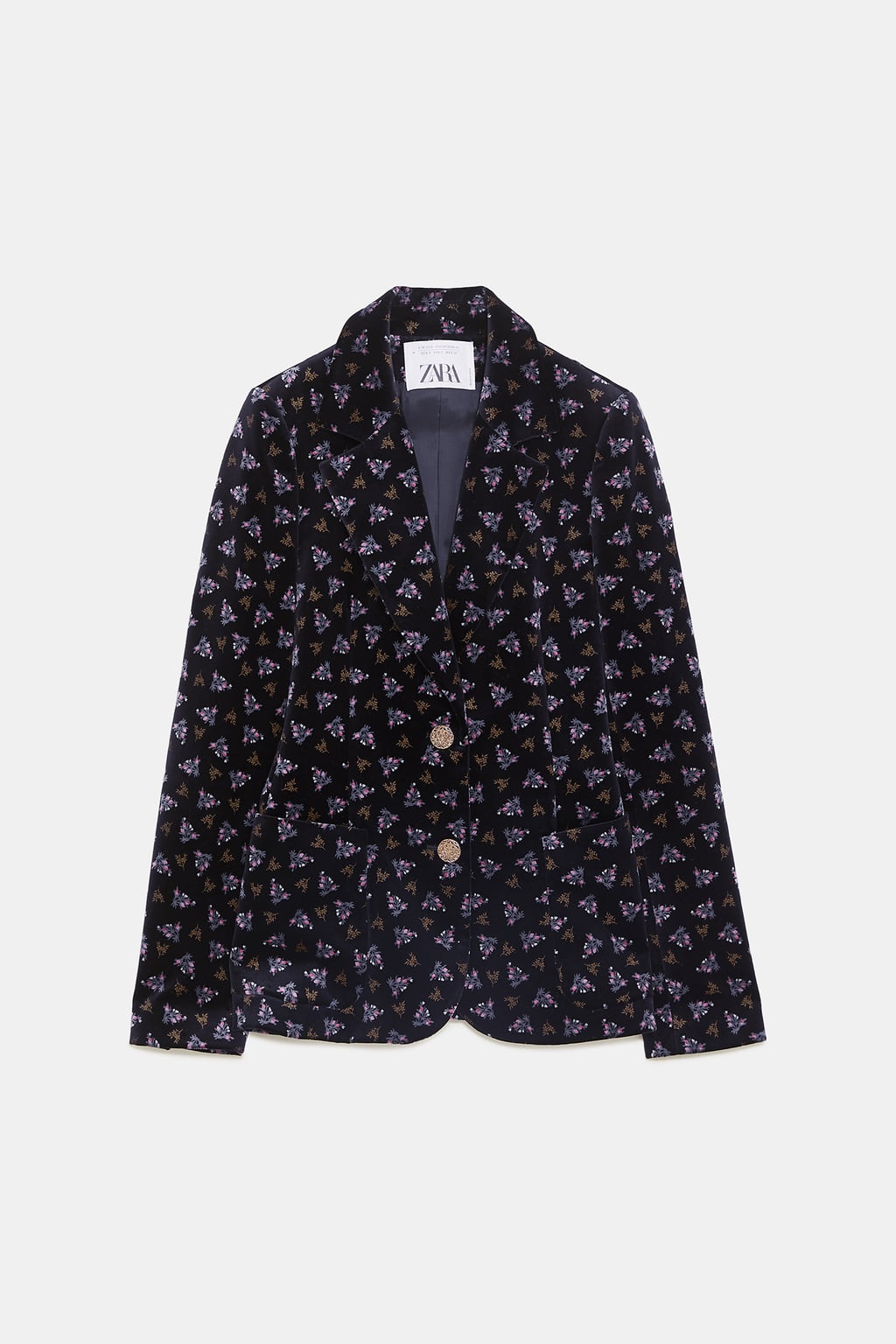 Chaqueta de terciopelo con estampado invernal de Zara.