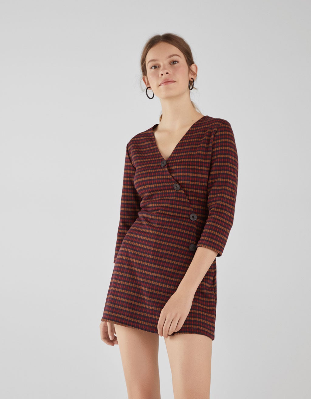 Mono corto con botones de Bershka: 17,99 euros.