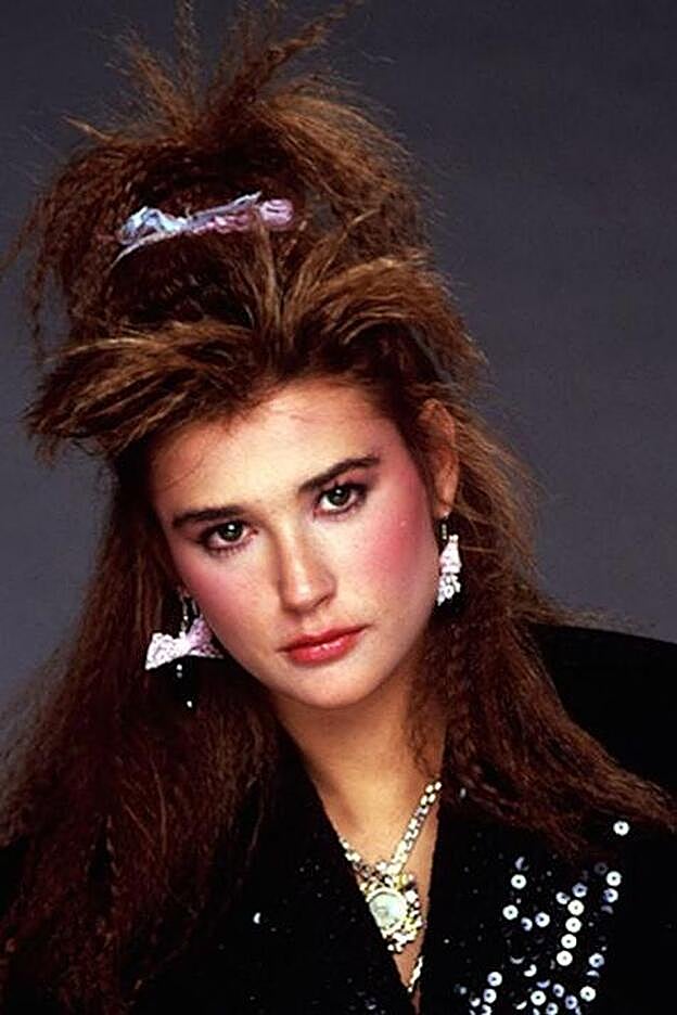 Demi Moore en los 80, con el típico peinado con planchas.